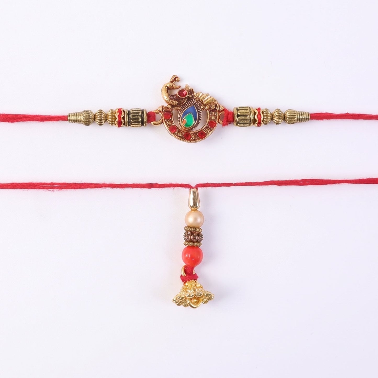 Close-up of Kundan work on Peacock motif of Bhabhi Rakhi with pearl accents