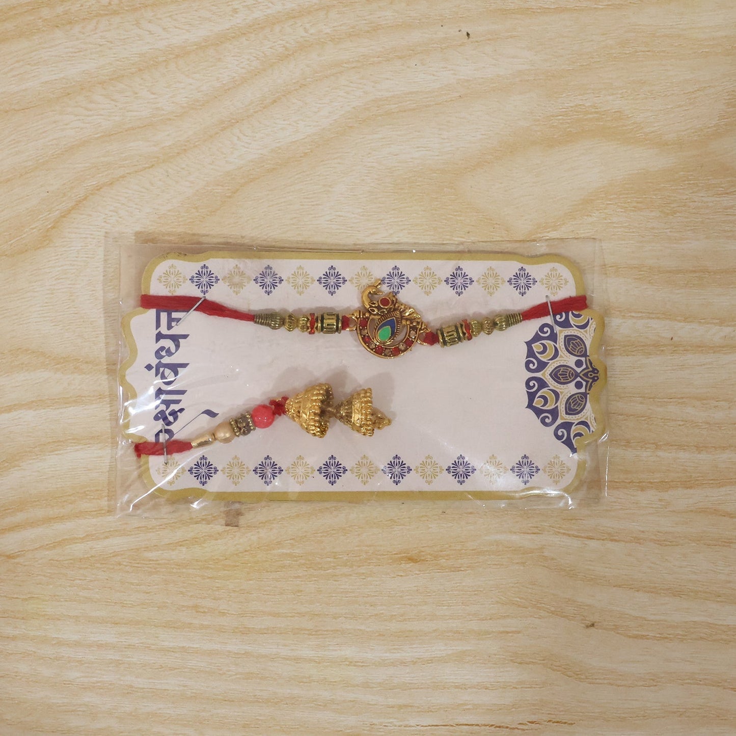Side angle of Peacock Pendant Bhabhi Rakhi with Jhumka Latkan