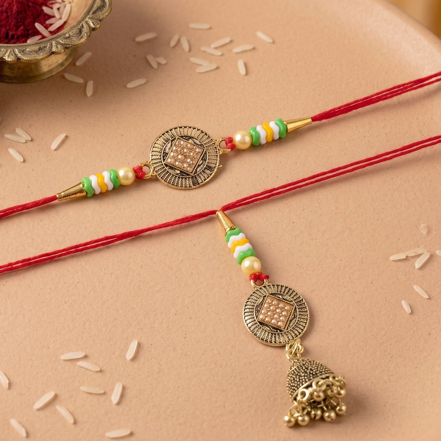 Detailed view of beads and coin centerpiece on Bhabhi Rakhi