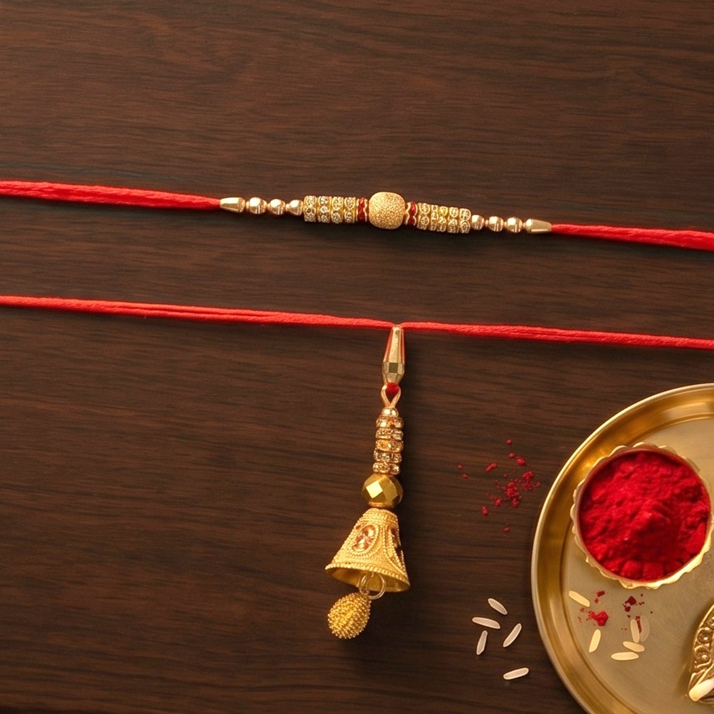 Golden Bhabhi Rakhi displayed with detailed pearl drop latkan