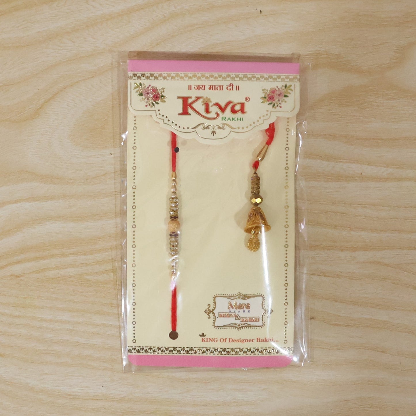 Golden Bhabhi Rakhi with detailed pearl drop latkan on display
