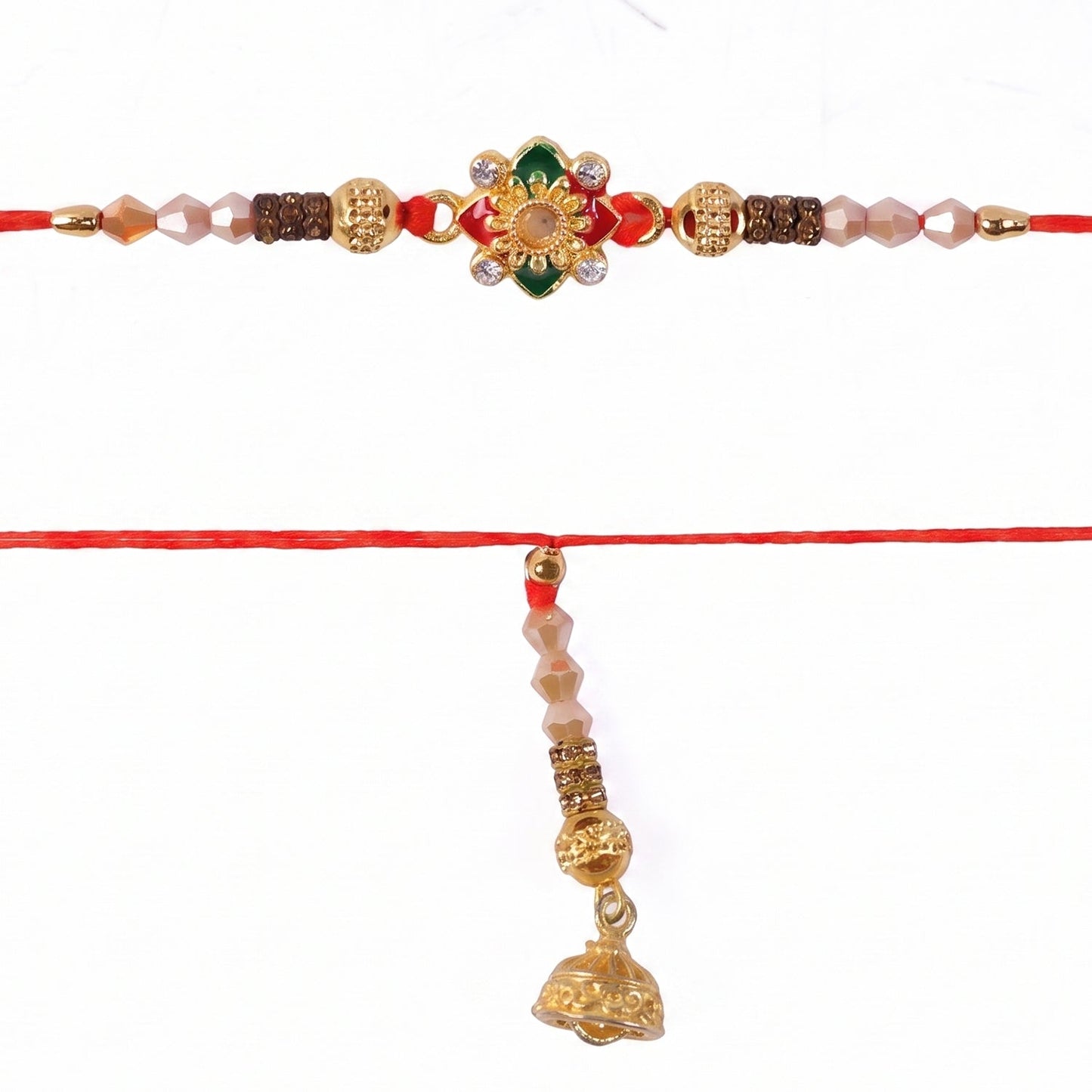 Side angle of Floral Pearl Bhabhi Rakhi showing thread and gold latkan