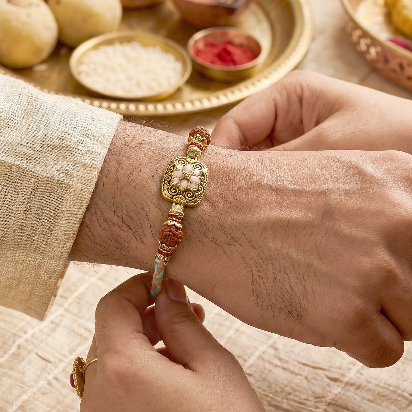 Detailed view of Golden Bead Bhabhi Rakhi