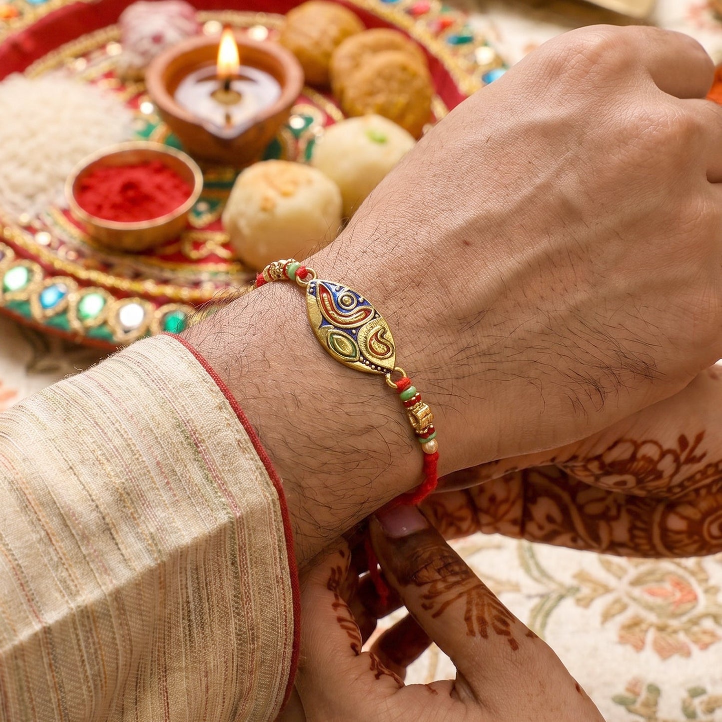 Colorful meenakari Bhabhi Rakhi with detailed craftsmanship