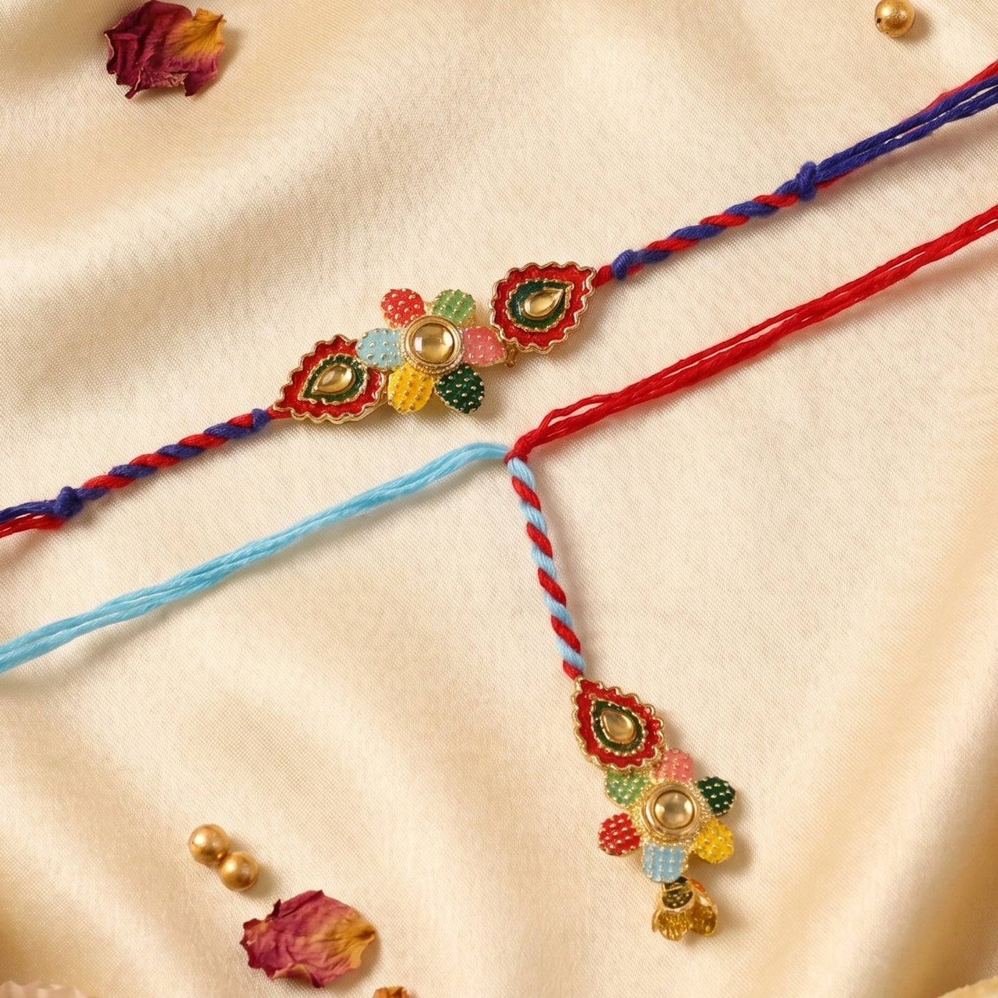 Multicolor thread Bhabhi Rakhi with floral latkan on white background