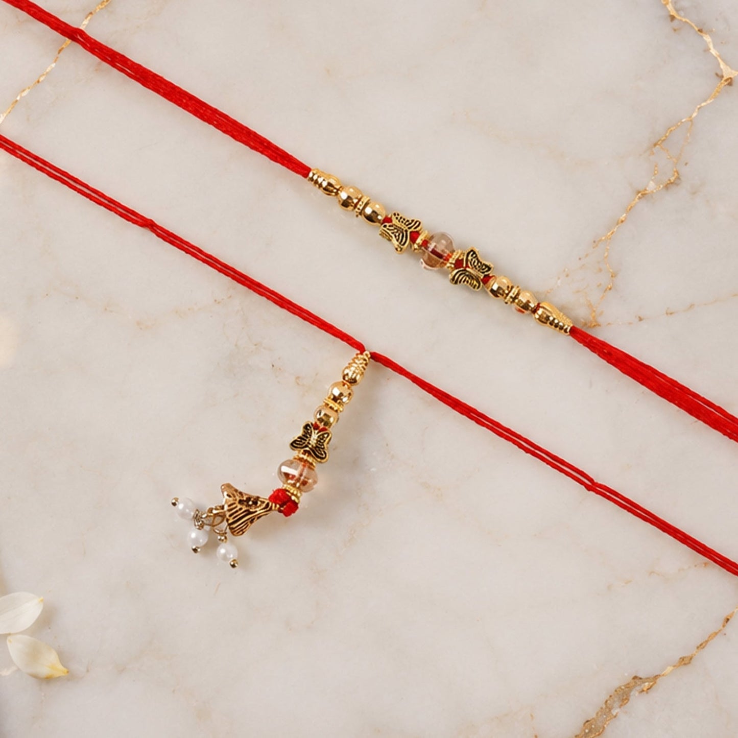 Side angle of Sleek Stone Bhabhi Rakhi highlighting design intricacy