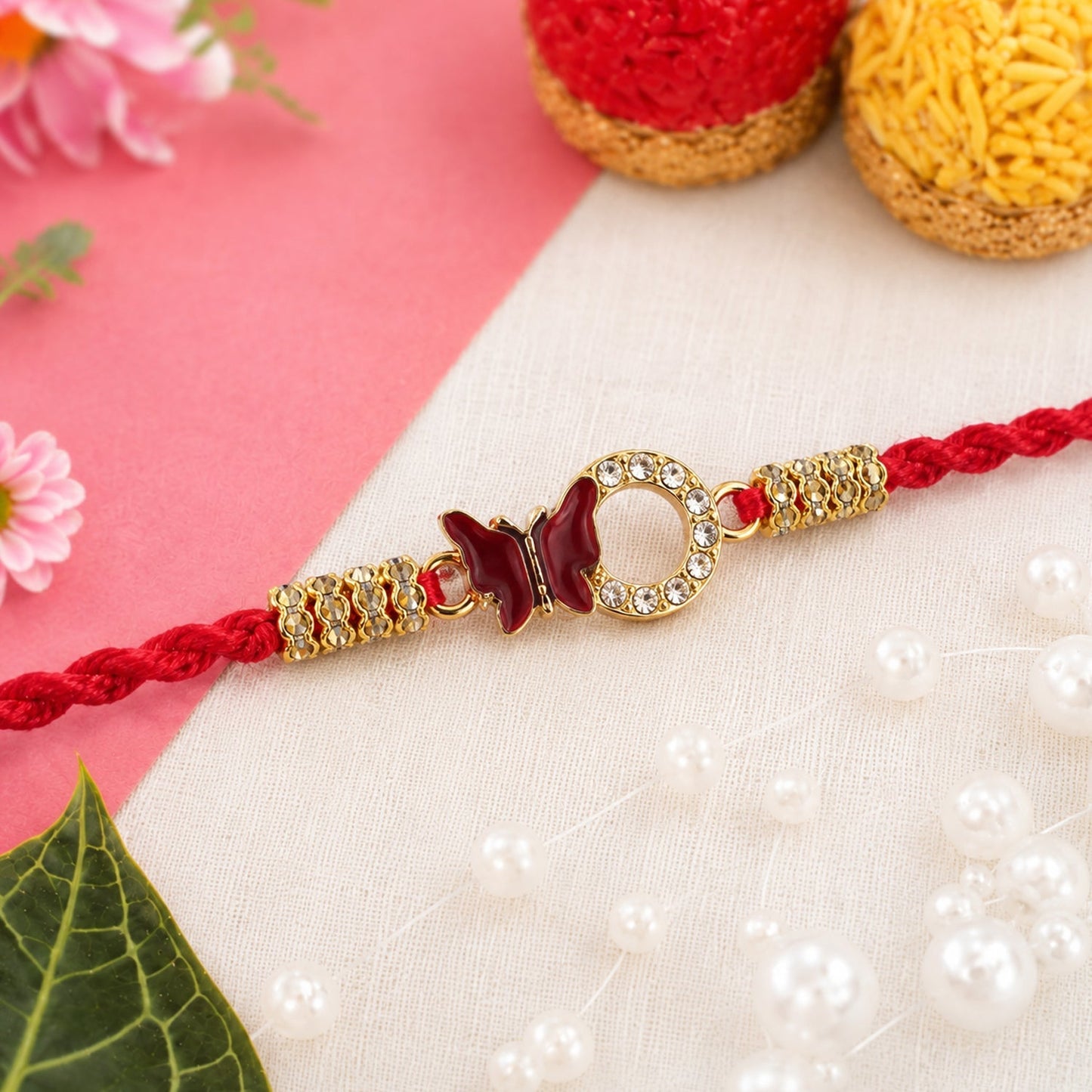 Handcrafted Mirror Stone Bhabhi Rakhi with vibrant red thread