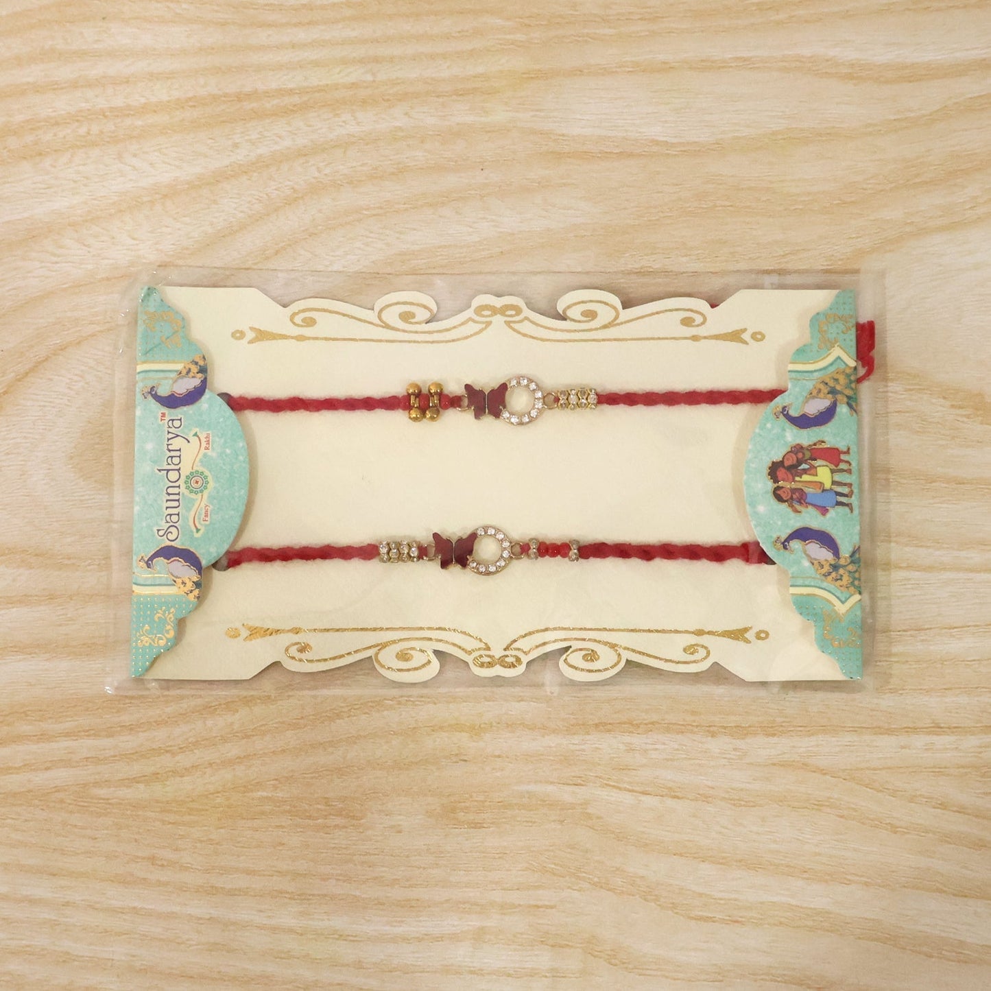 Side view of Mirror Stone Bhabhi Rakhi on wrist with red thread