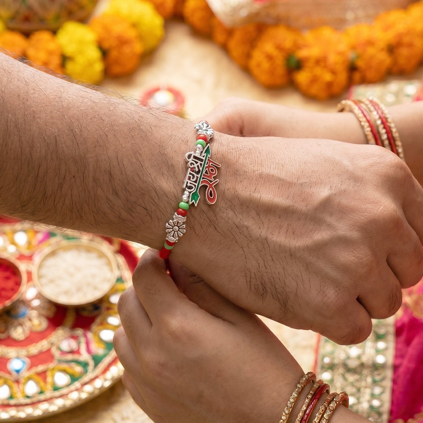 Top view of Bhaiya Bhabhi Rakhi Pair with silver accents