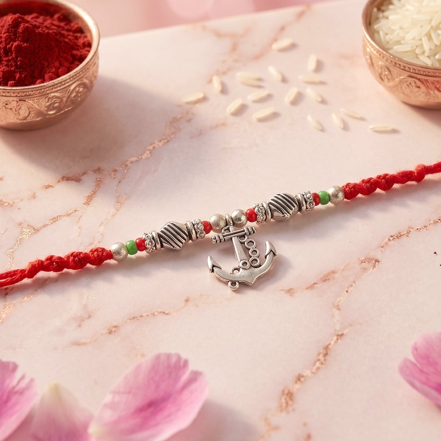 Side view of Bhaiya Bhabhi Rakhi Pair showing charm details