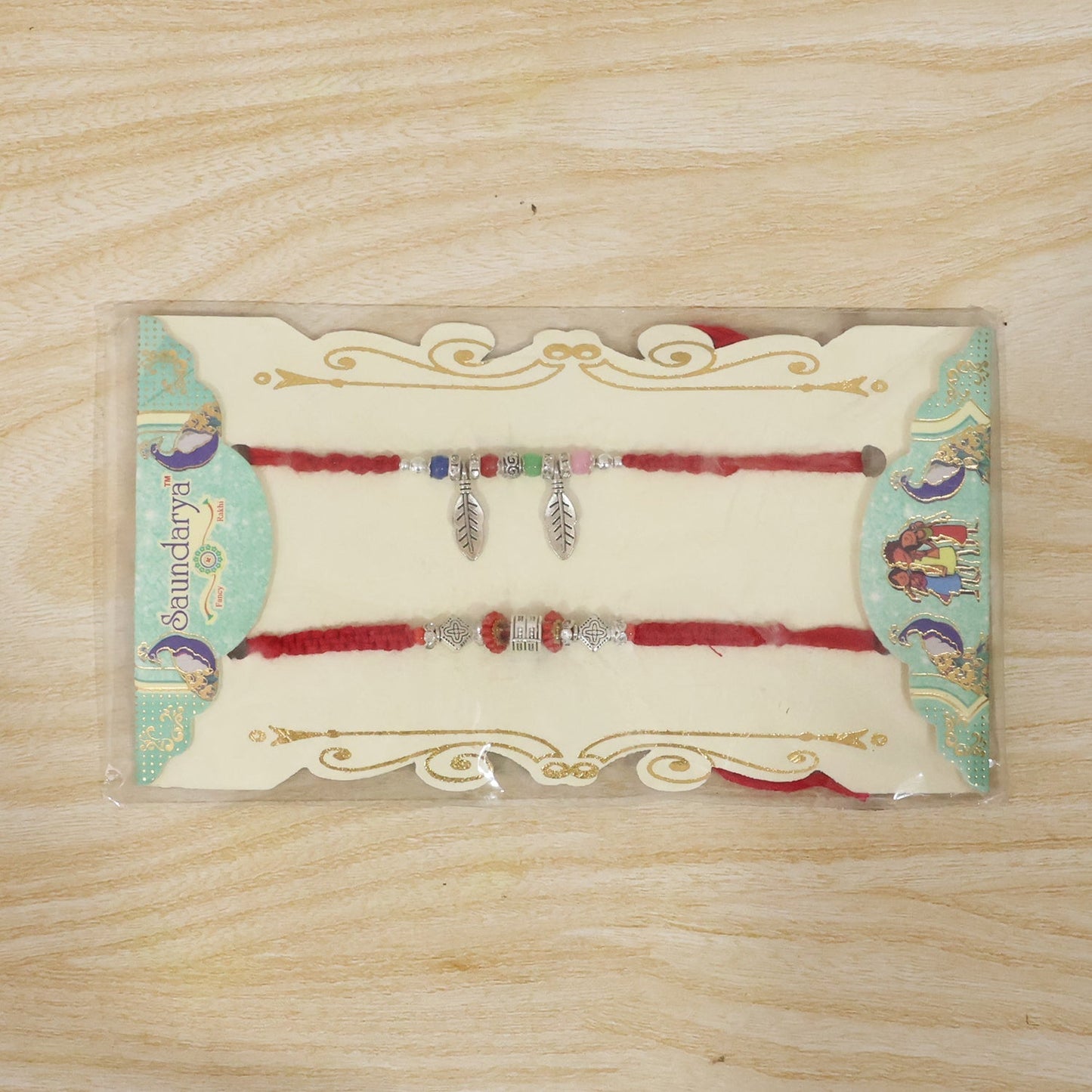 Decorative Bhabhi Rakhi displayed on white background