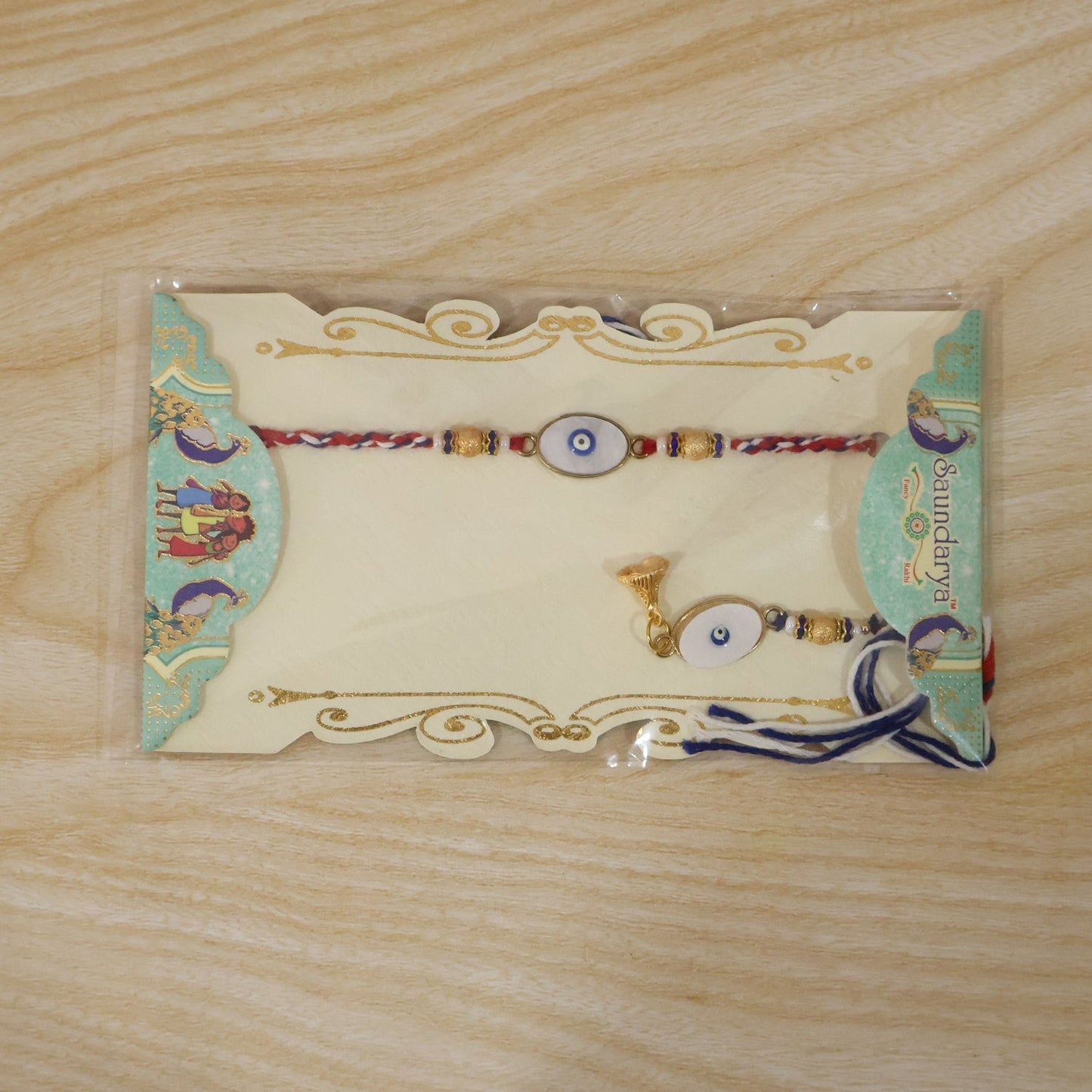 Traditional background with Evil Eye Bhabhi Rakhi display highlighting craftsmanship