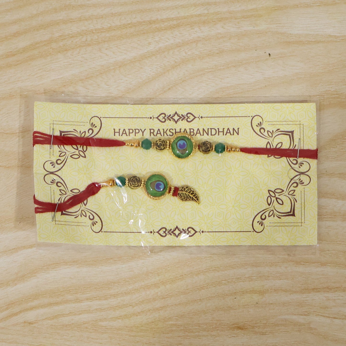 Premium embroidery on Evil Eye Peacock Bhabhi Rakhi with intricate details