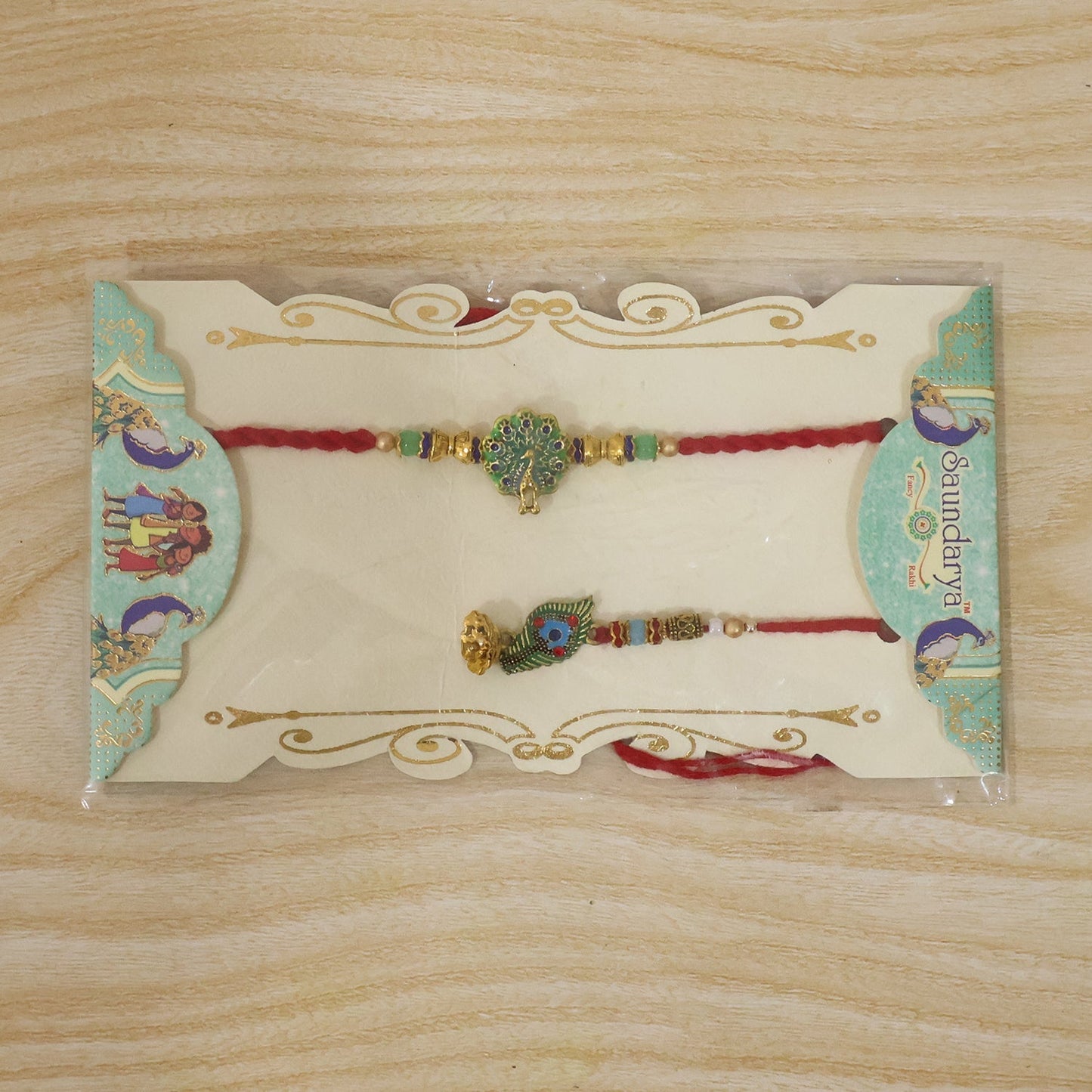 Latkan detail on Peacock Bhabhi Rakhi with green stones