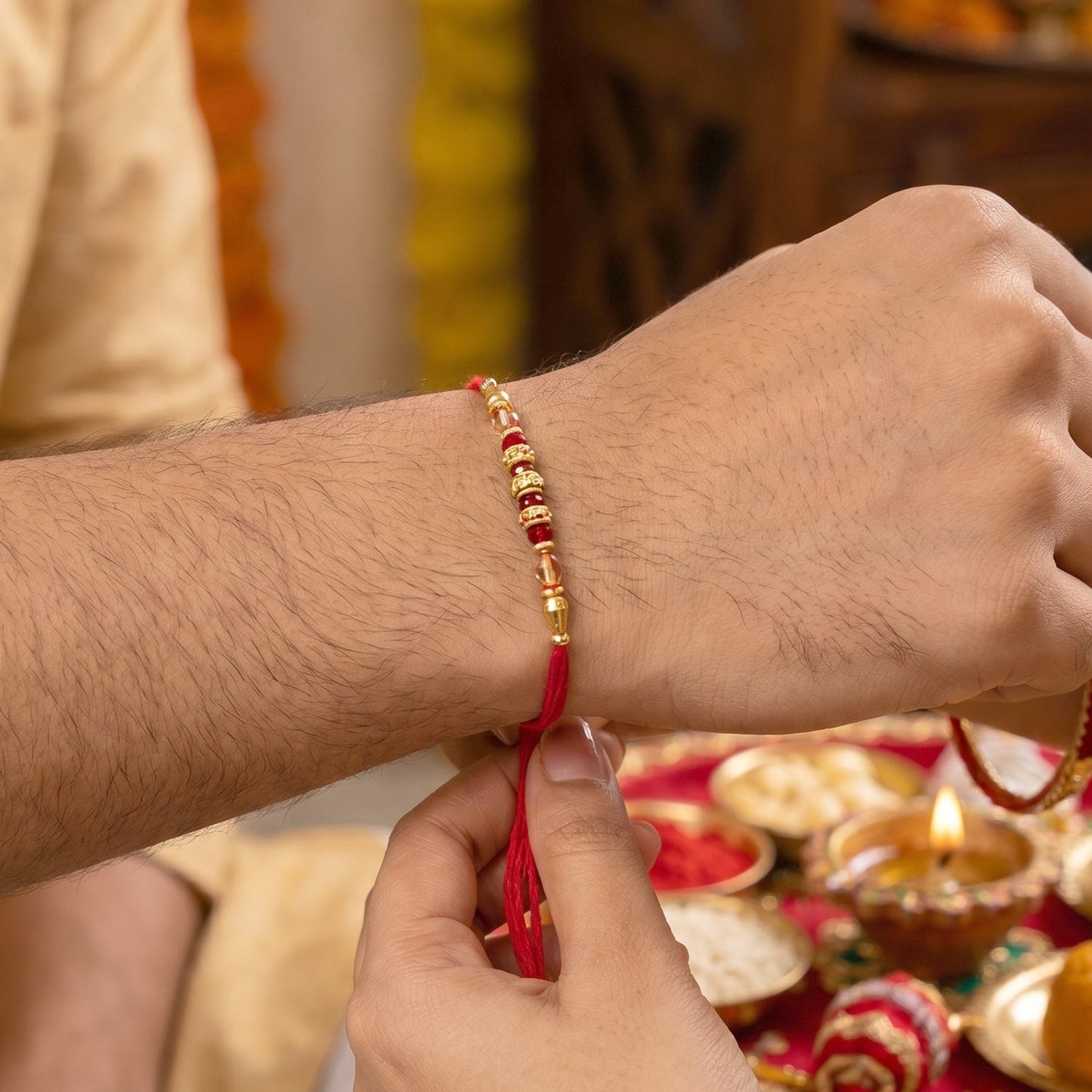 Peacock latkan Bhabhi Rakhi showing pearl beads and detailed craftsmanship