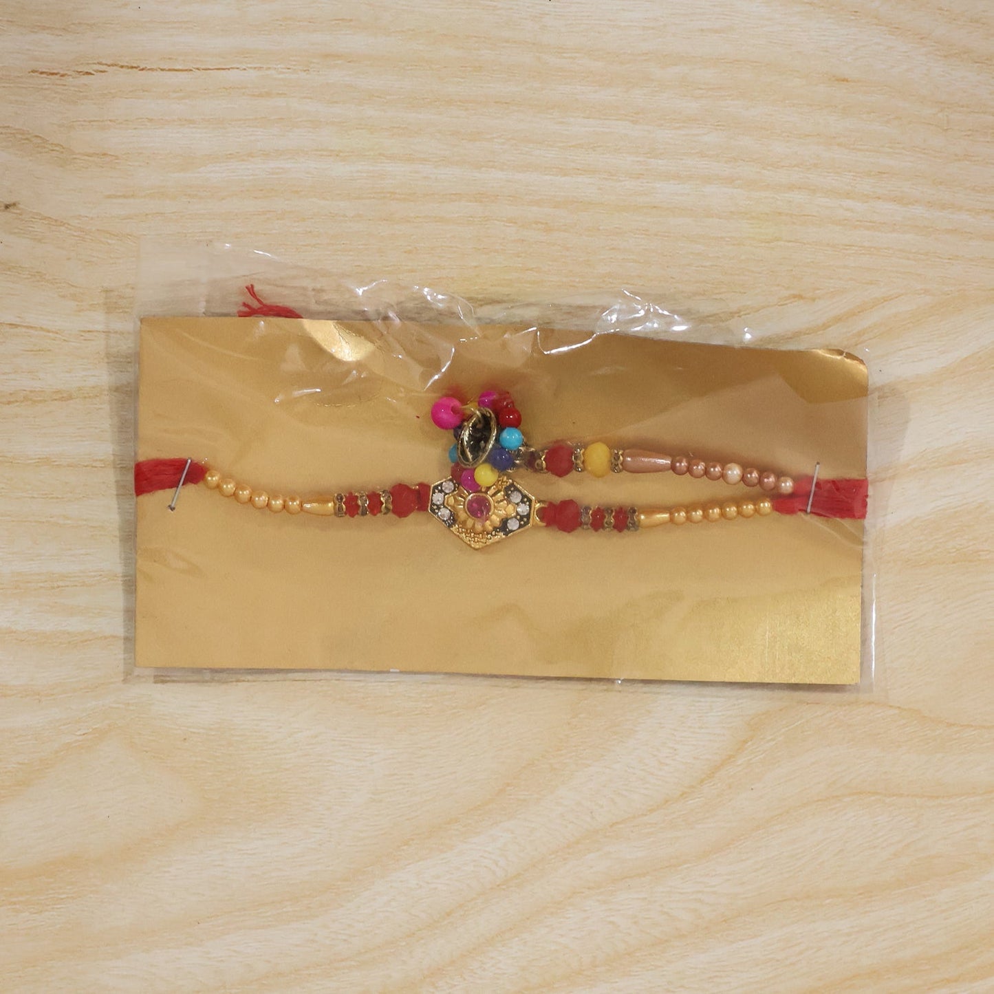 Close-up of colorful beads and craftsmanship on Rakhi