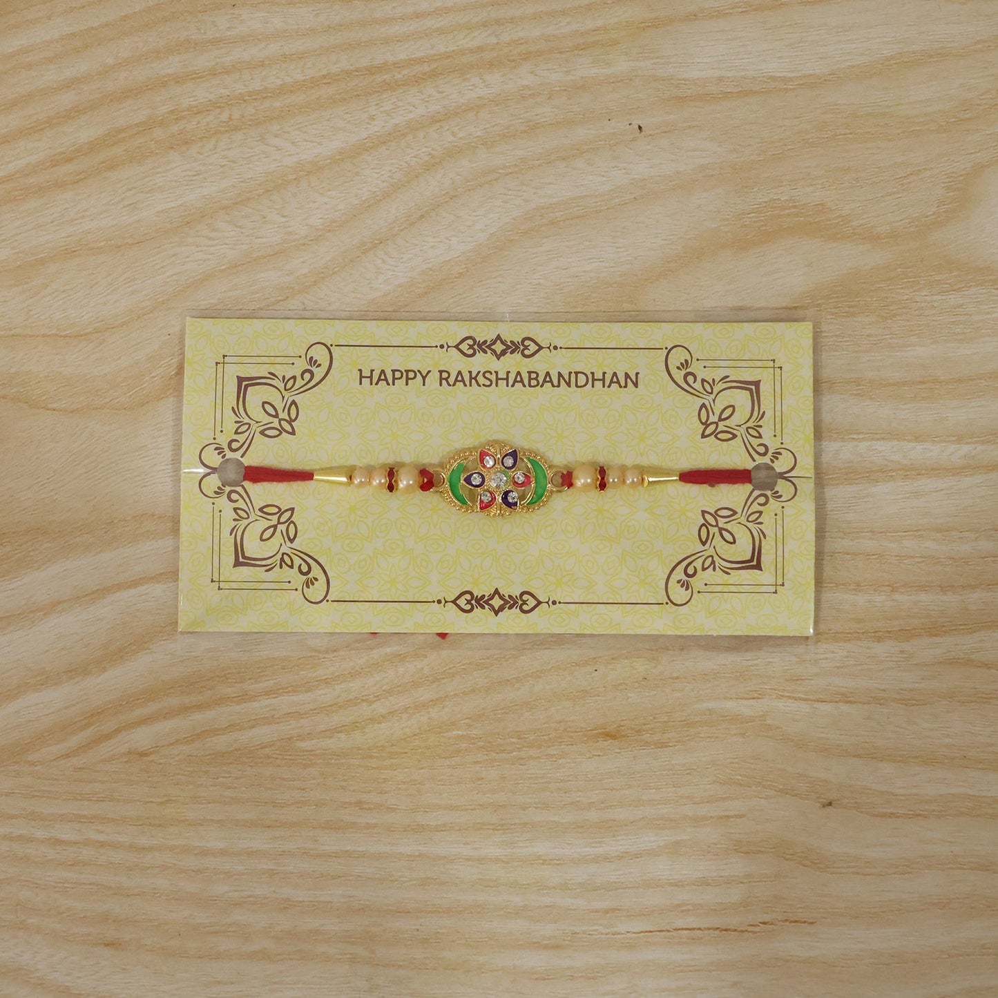 Elegant pearl beaded floral Rakhi for Raksha Bandhan