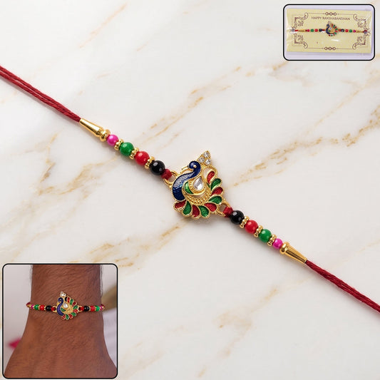Vibrant designer Peacock Rakhi with multicolor beads on white background