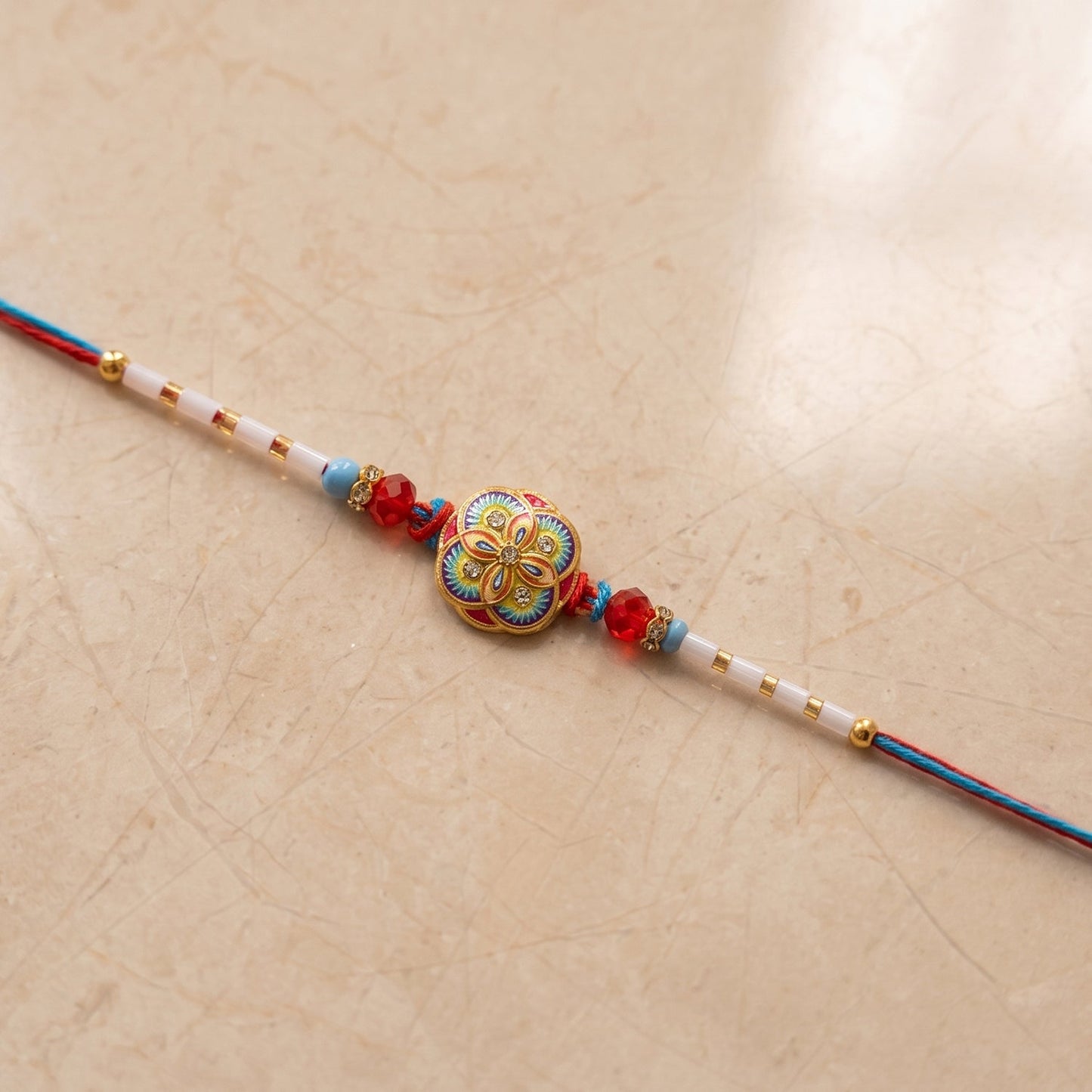 Close-up of beads on floral Rakhi