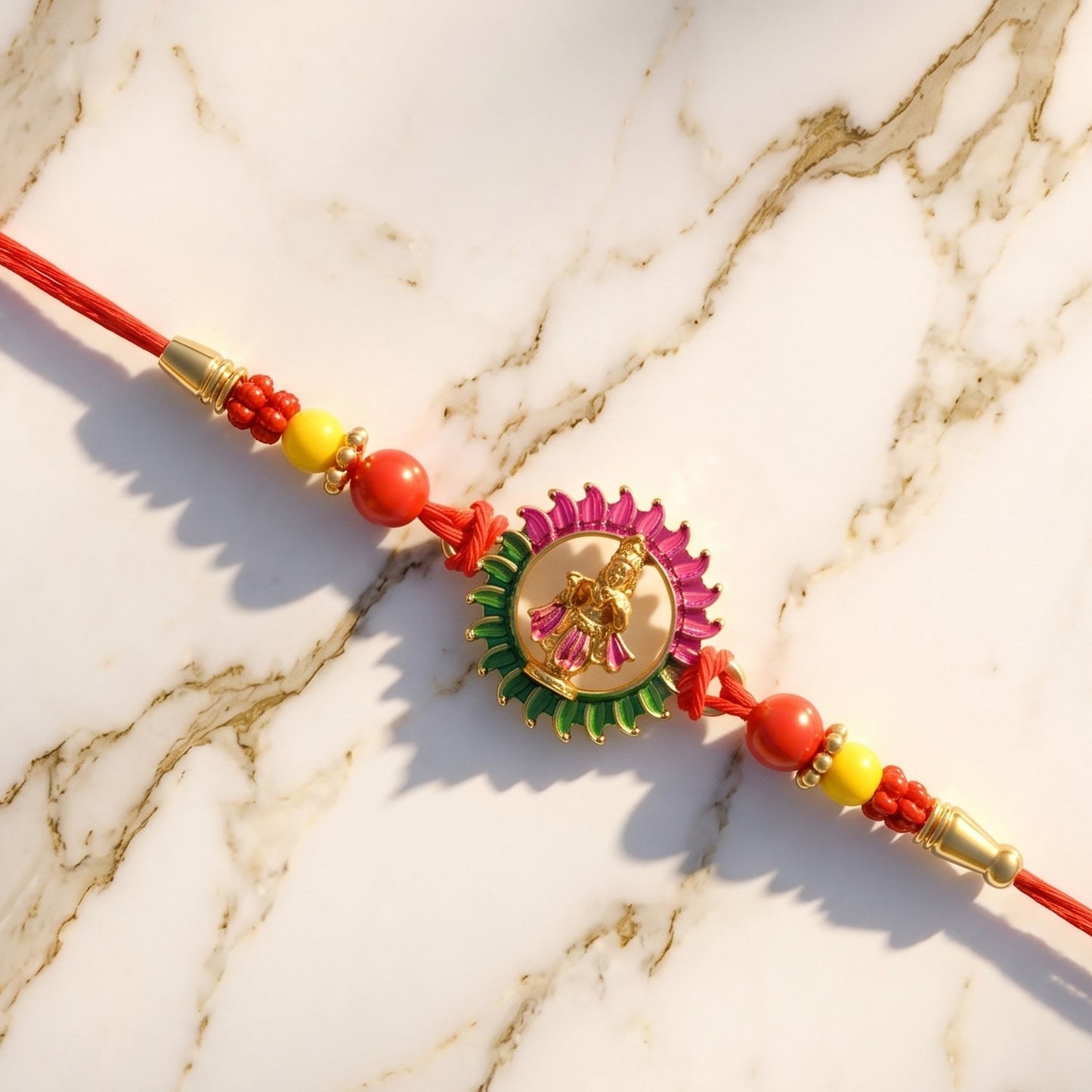 Hand tying circular traditional Rakhi with beads