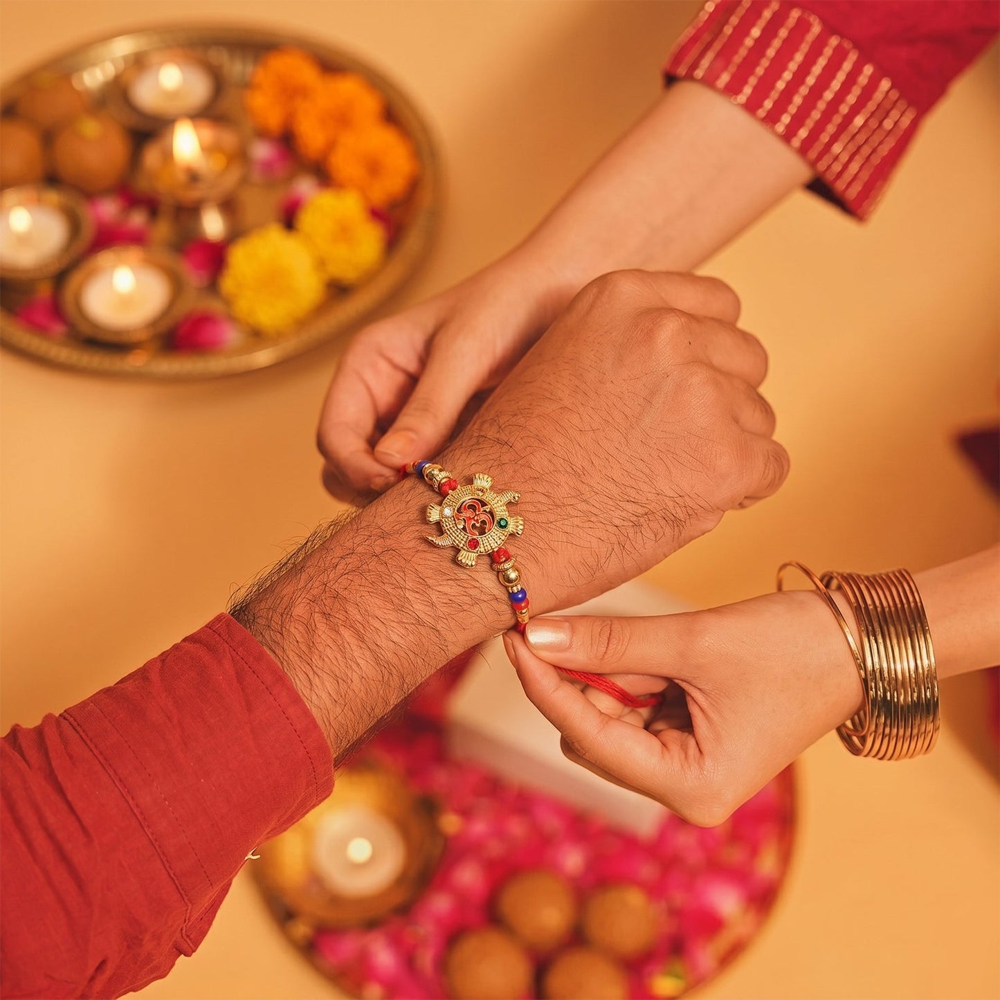 Colorful bead details on Om Turtle Design Rakhi