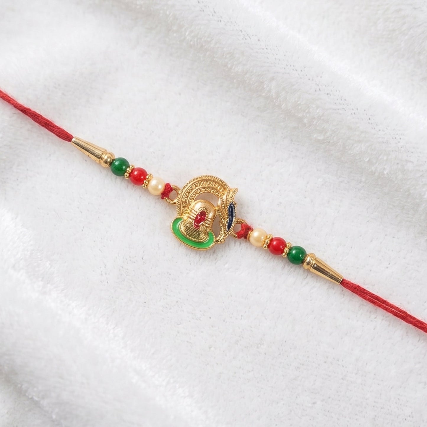 Colorful bead decoration on Shivling Rakhi