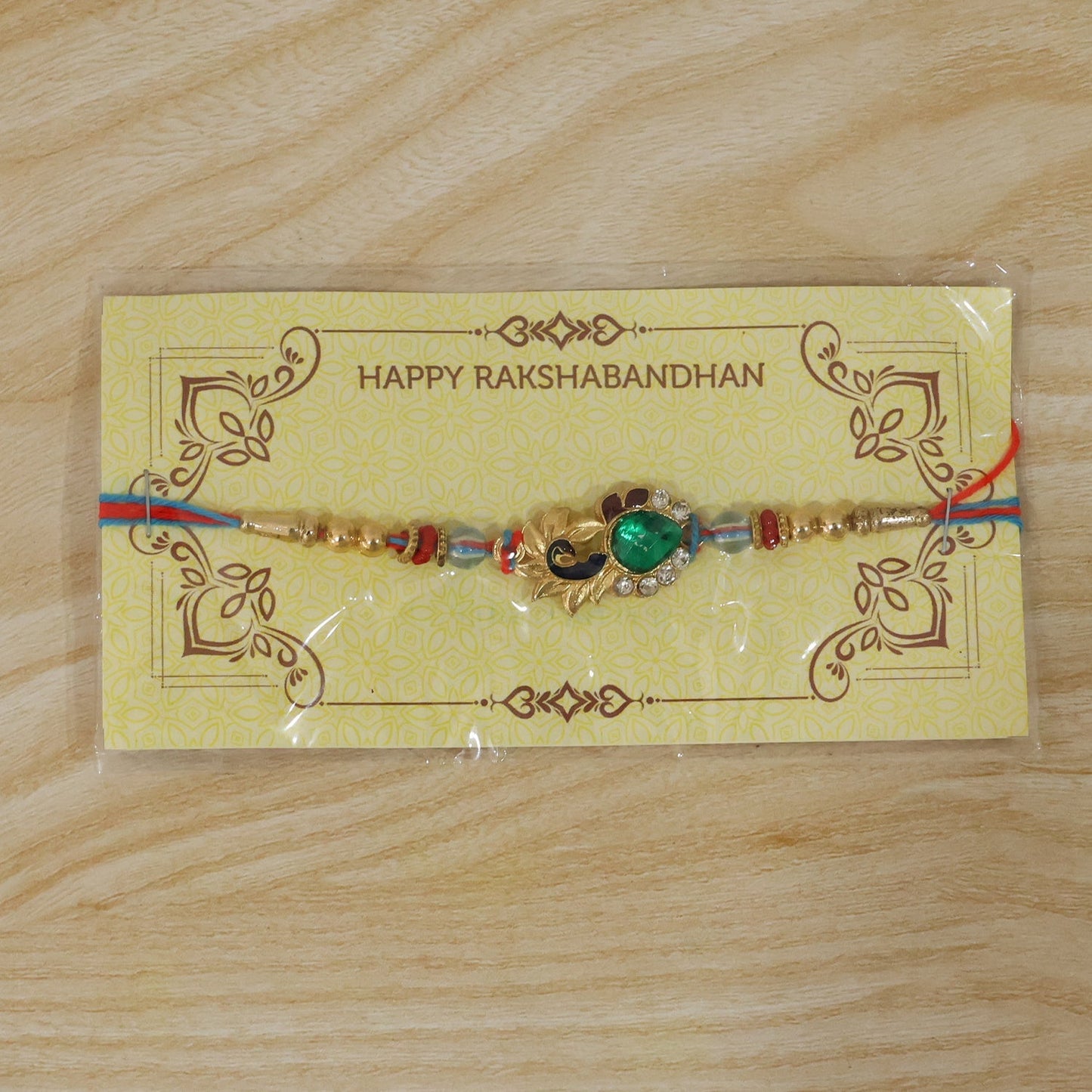 Packaging of Silver Peacock Design Rakhi