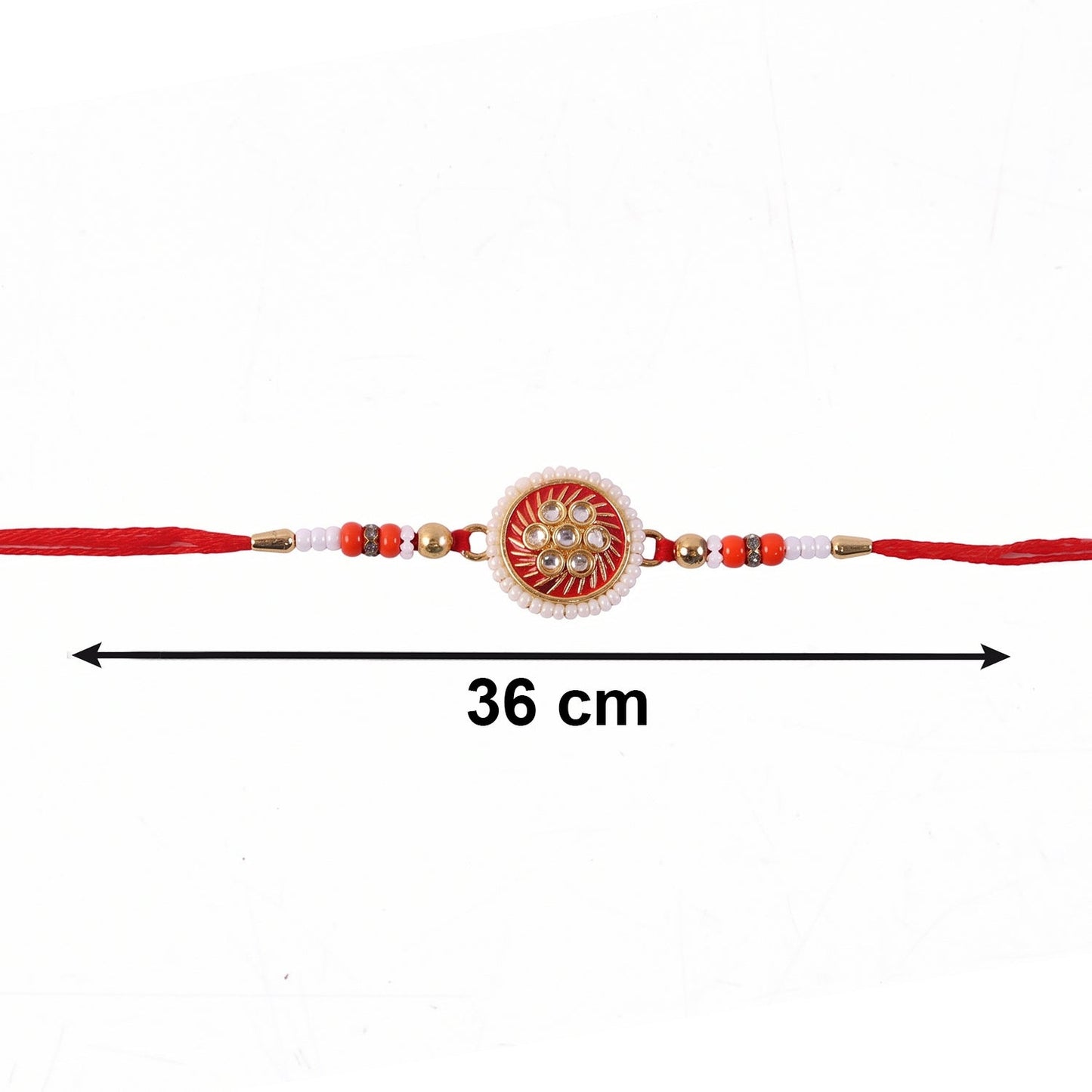 Golden floral Rakhi displayed with soft thread detailing