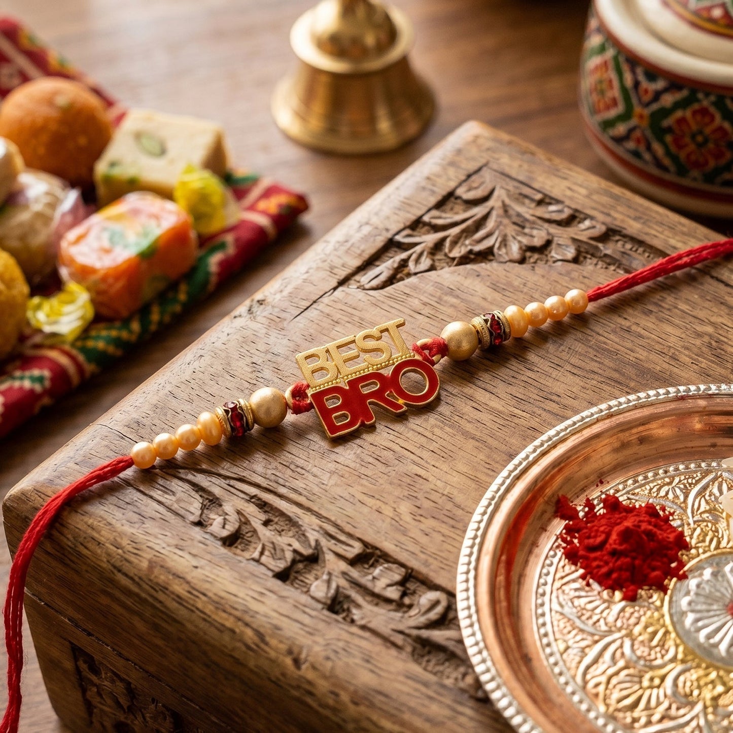 Side view of elegant Rakhi with pearl beads