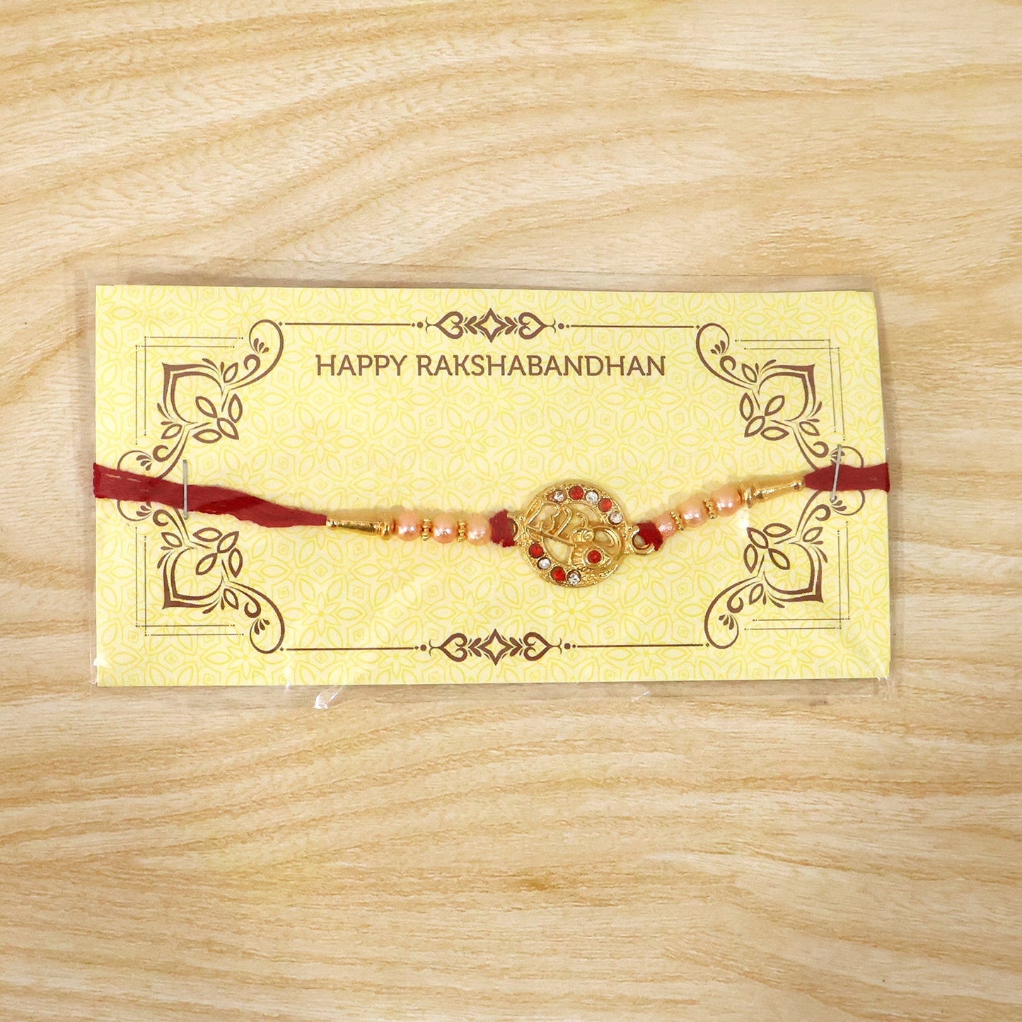 Festive setting featuring Radhe Designer Rakhi on a red background