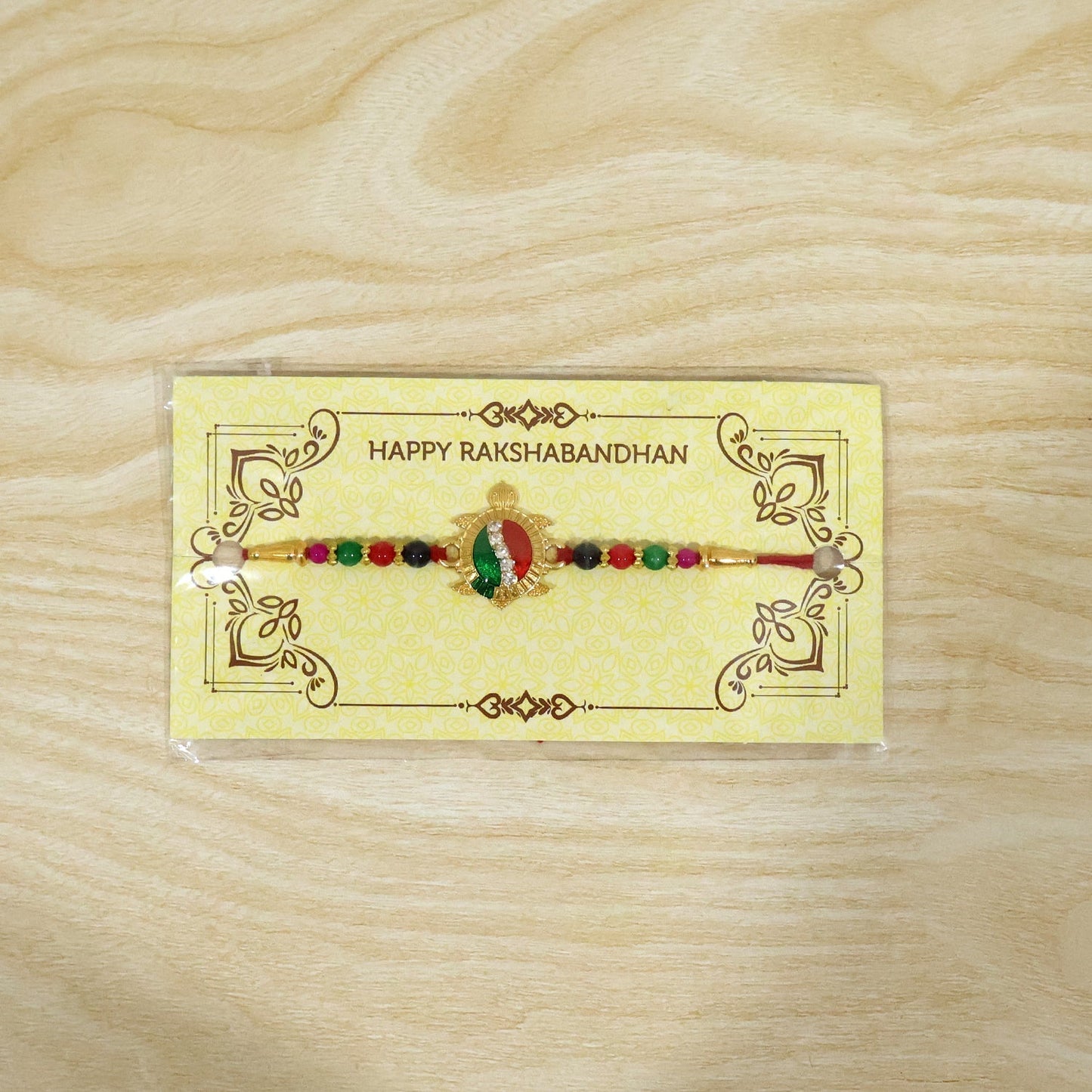 Back view of Turtle Designer Rakhi Stone Work