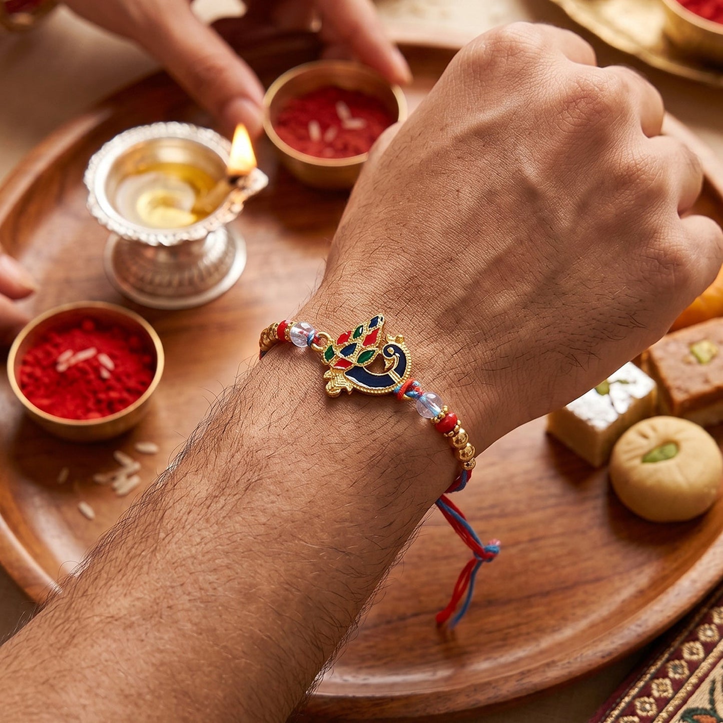 Close-up of vibrant beads on peacock rakhi