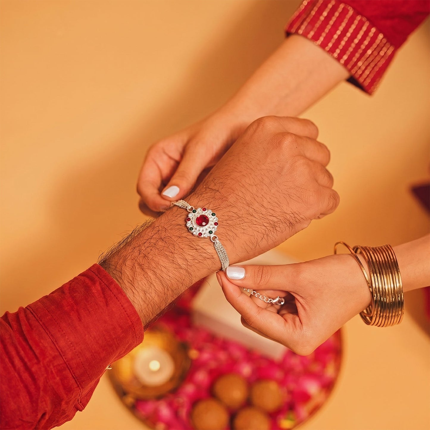 Silver Stone Chain Rakhi displayed against a festive background.