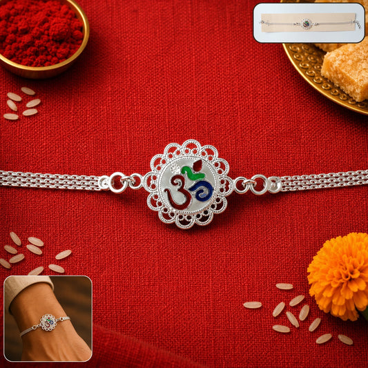Close-up of elegant silver Om chain Rakhi with intricate detail