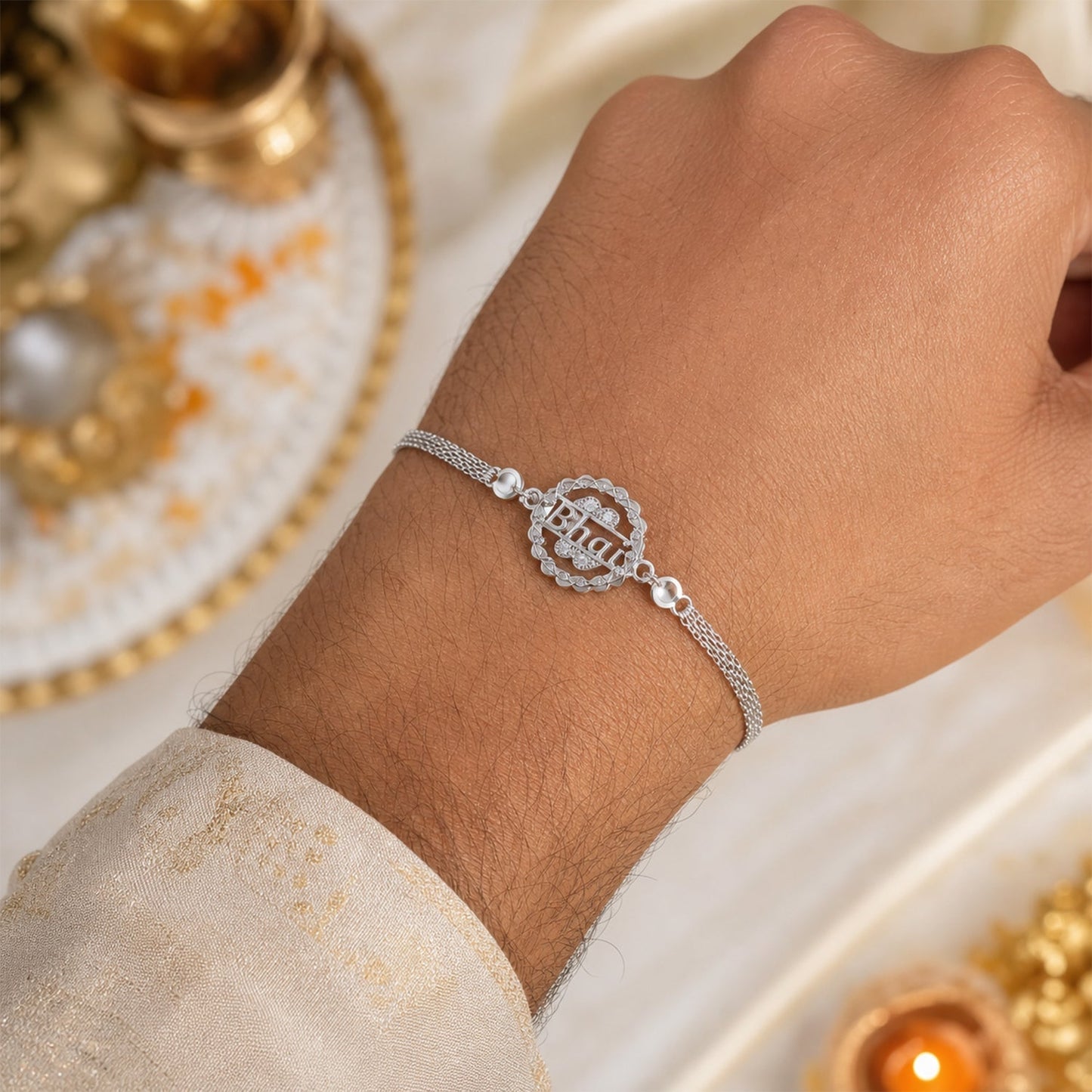 Close-up detail of the intricate modern round charm on the Silver Bhai Chain Rakhi.
