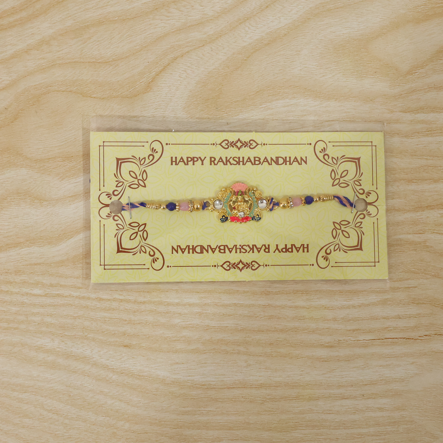 Decorative Goddess charm rakhi with beads for Raksha Bandhan