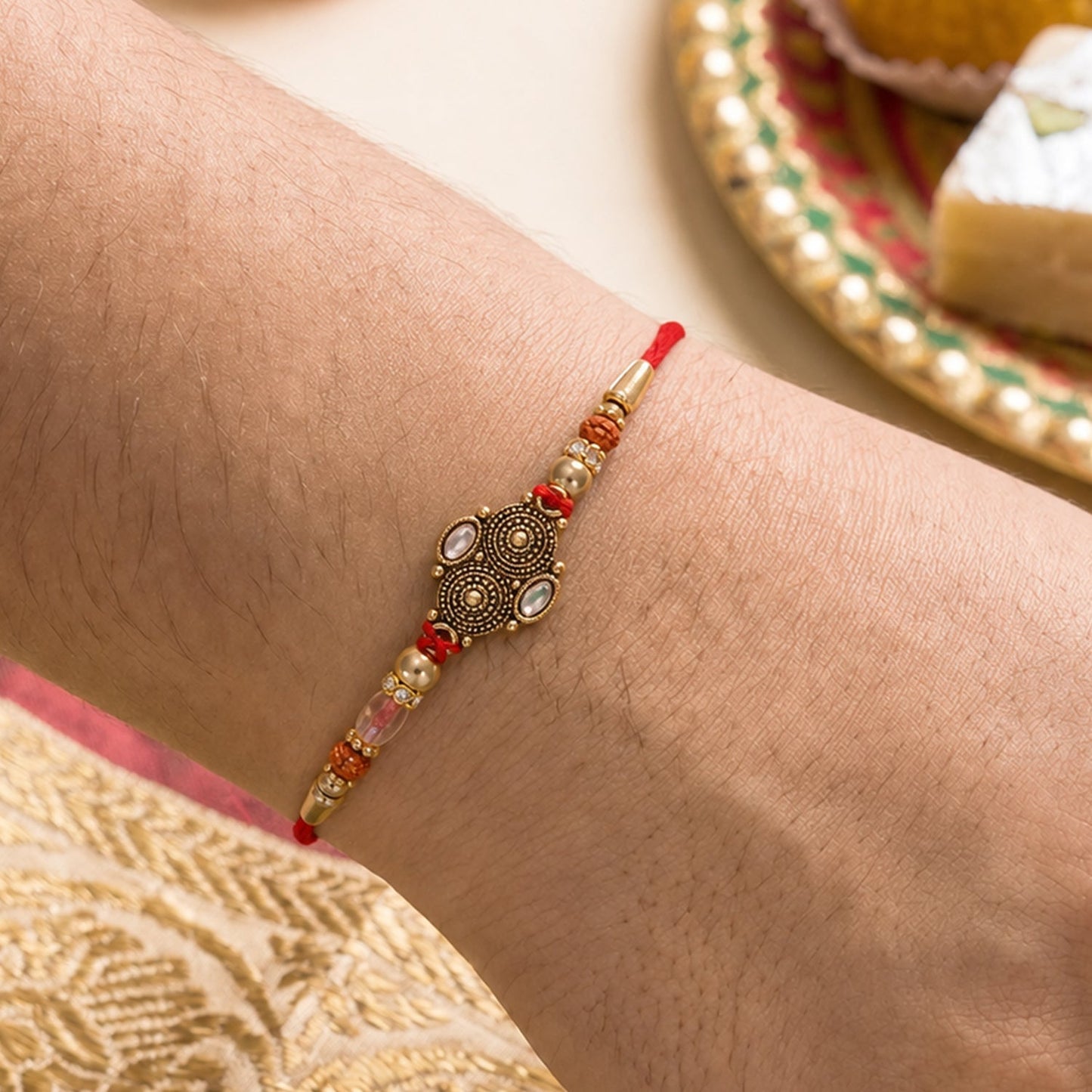 Traditional round Rudraksha Rakhi with beads - front view