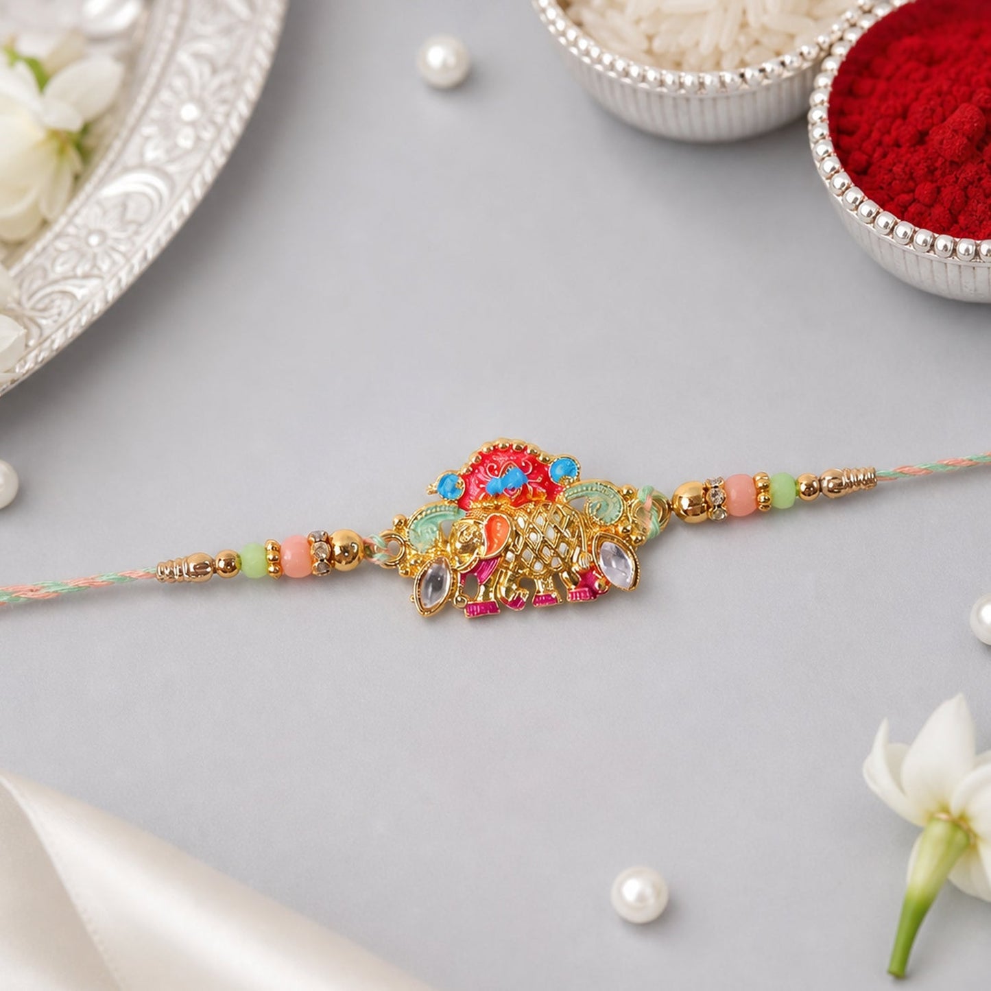 Designer colorful beads and elephant charm rakhi