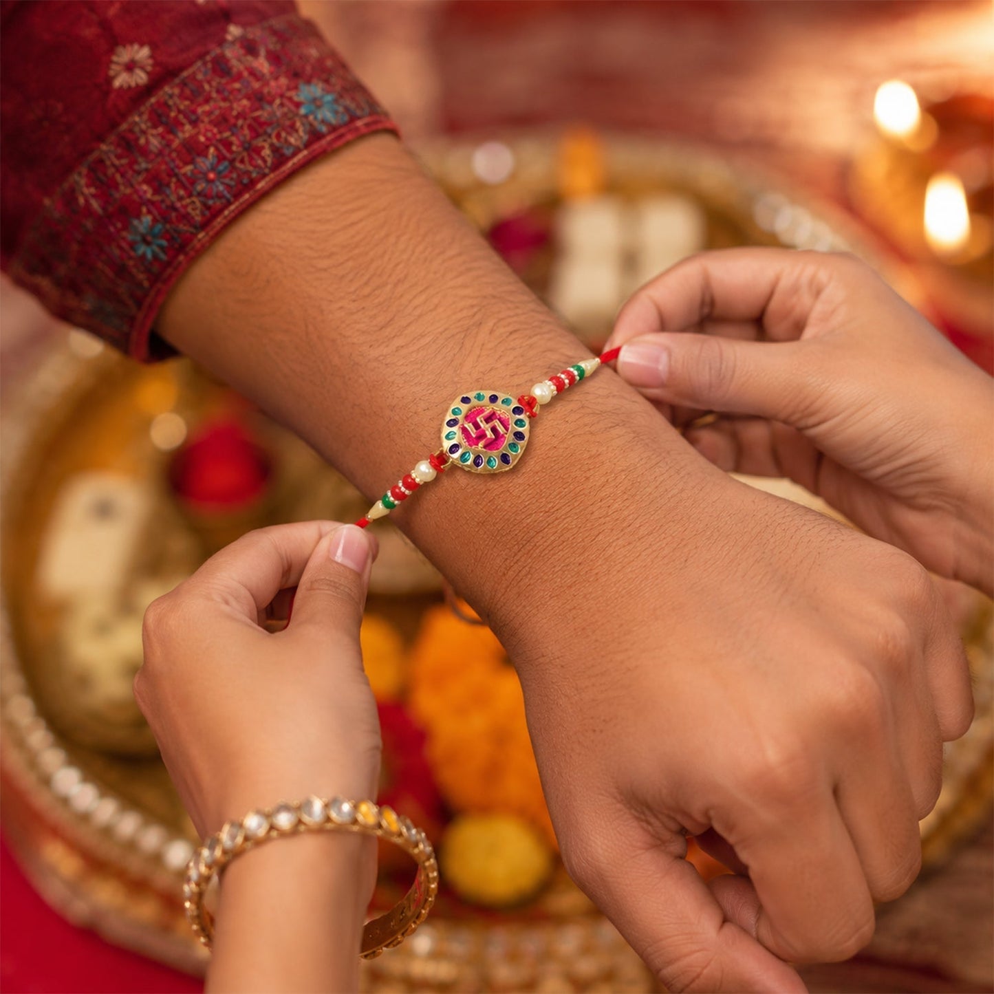 Close-up of swastik symbol on beaded rakhi with intricate details