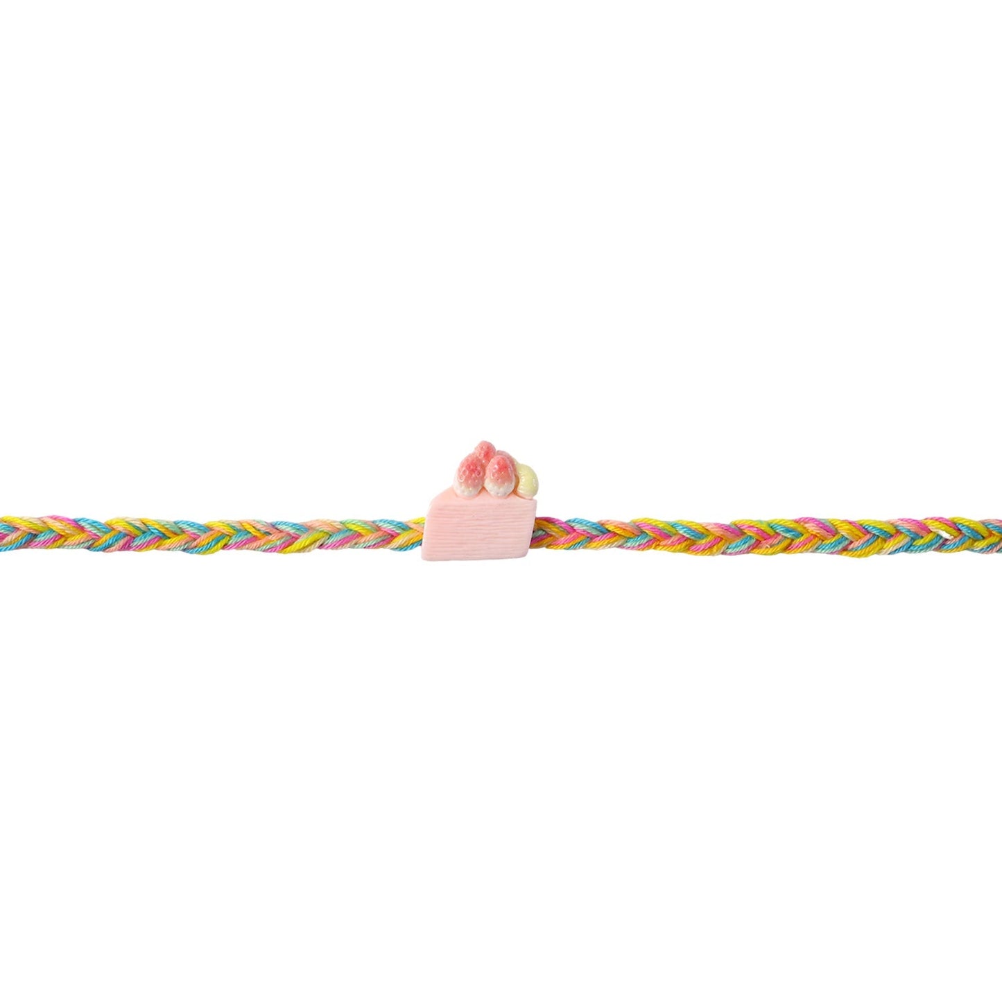 Top view of Rakhi showing strawberry cake charm and threads