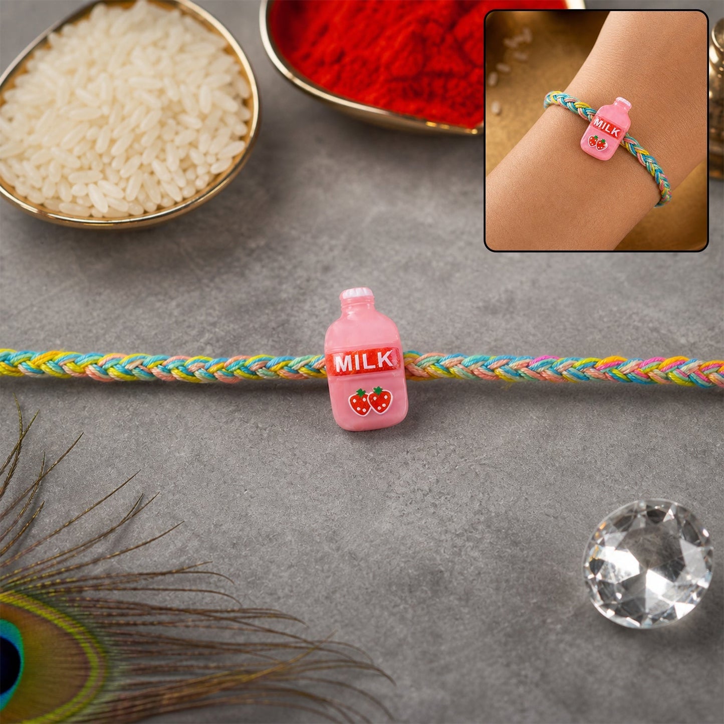 Front view of Milk Bottle Fancy Dori Rakhi with decorative design