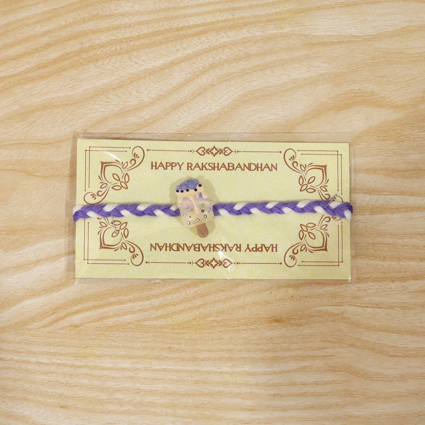 Full design display of the delightful Ice Cream Fancy Dori Rakhi.