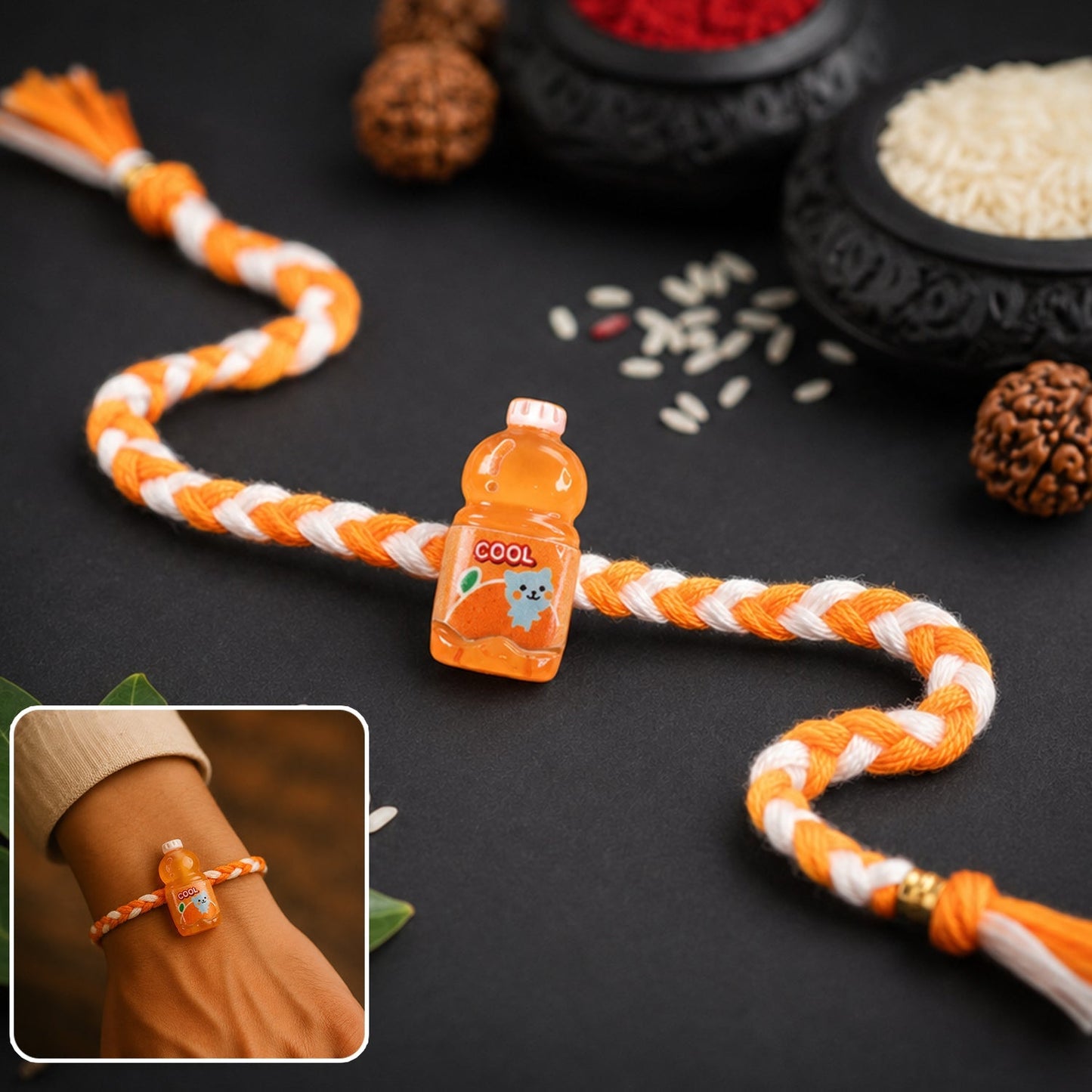Fancy drink bottle charm designer rakhi on white background