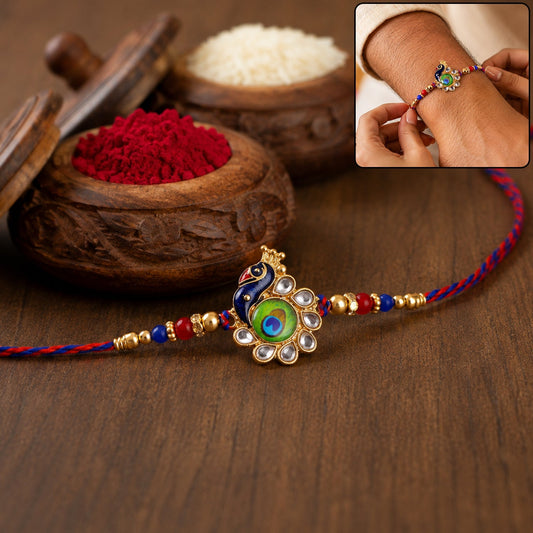 Front view of Peacock Feather Beaded Rakhi on white background