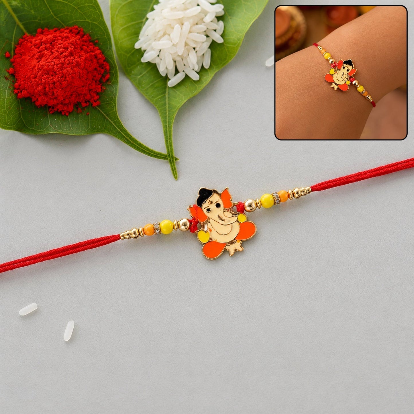 Divine idol charm rakhi with beads on a festive background