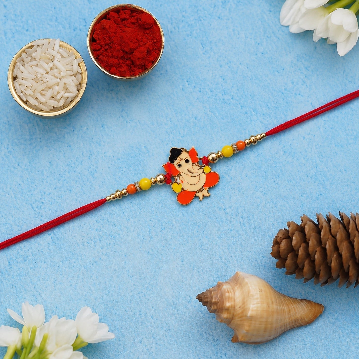 Top view of stylish divine idol rakhi