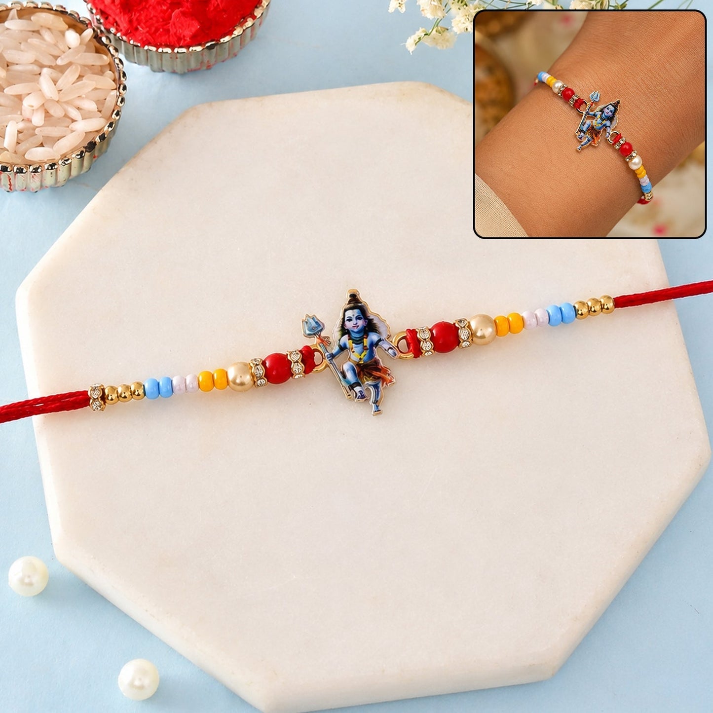 Beautiful Mahadev idol charm rakhi with colorful beads on thread