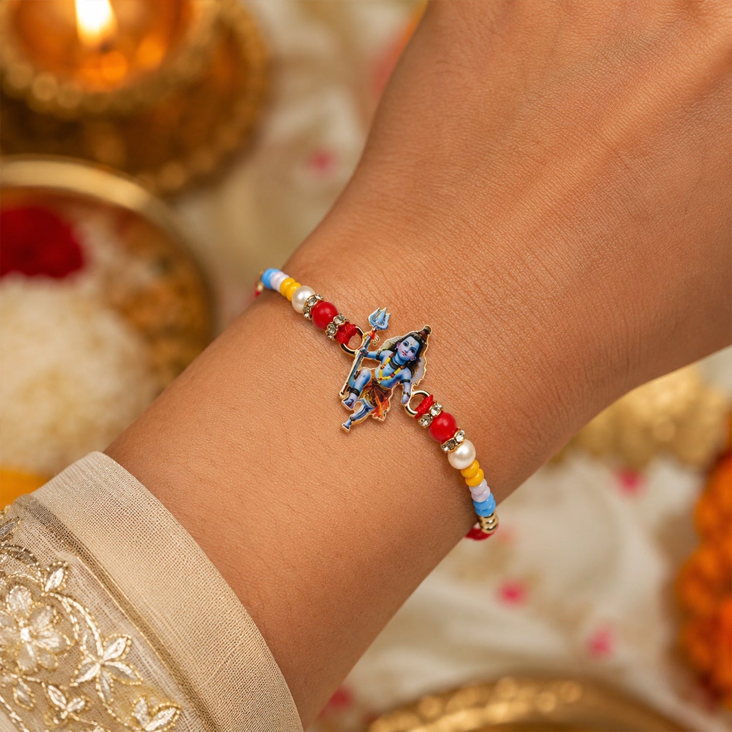 Mahadev idol rakhi tied on a wooden surface