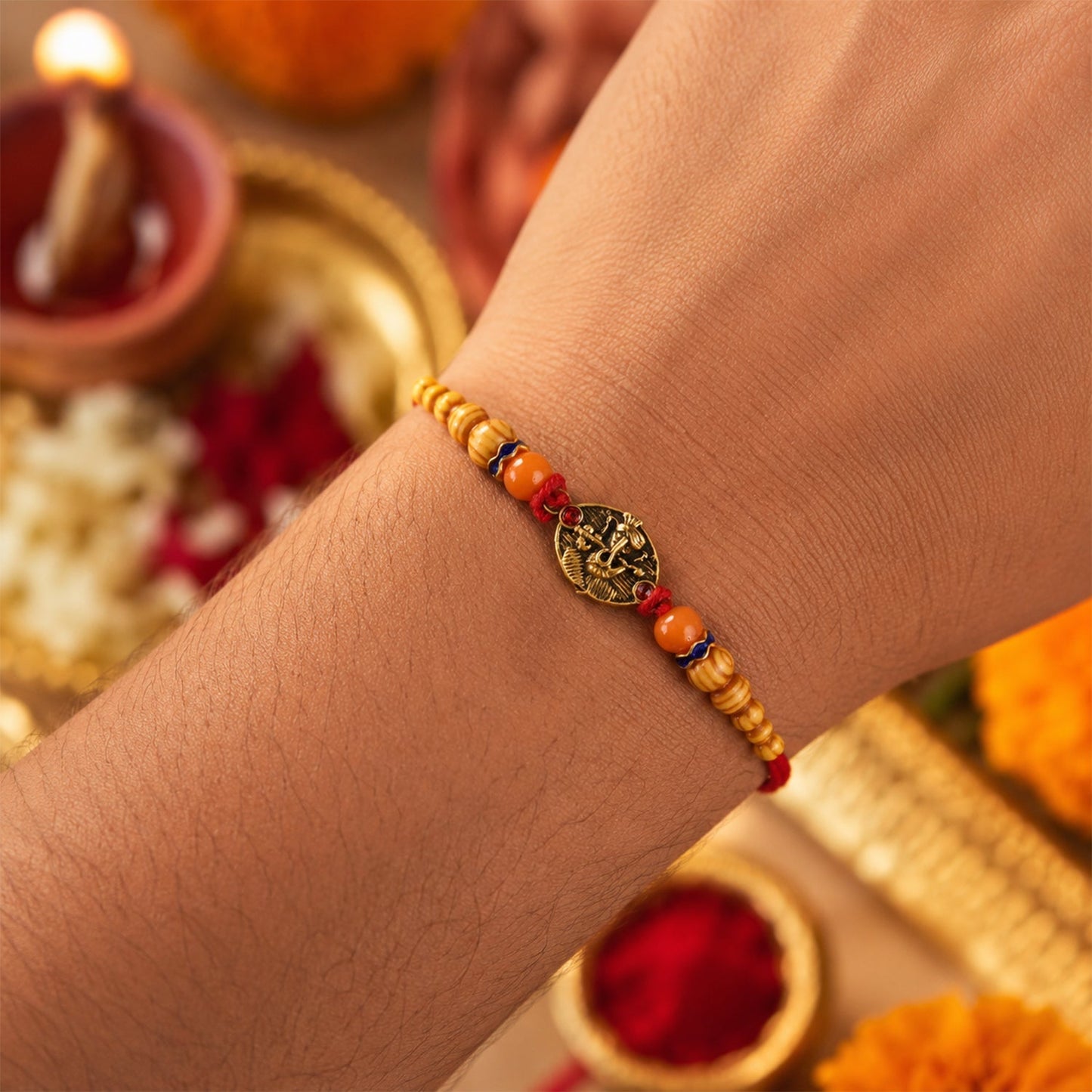 Designer Rakhi featuring wooden beads and divine charm details