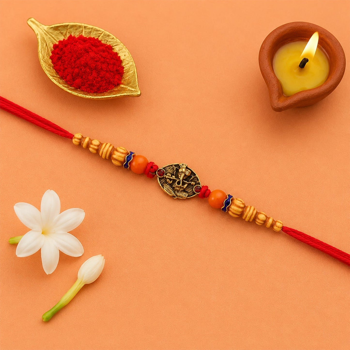 Close-up of rakhi with wooden beads and intricate charm